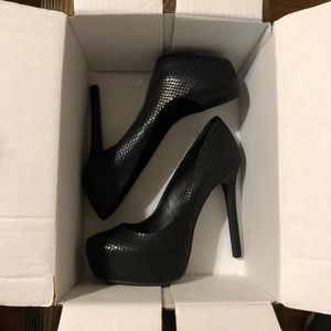 Black snakeskin platform heels